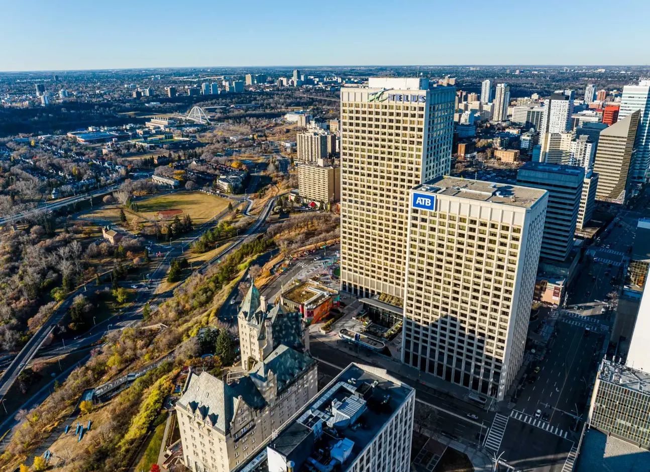 Aerial photograph of ATB Place office towers overlooking the Edmonton river valley