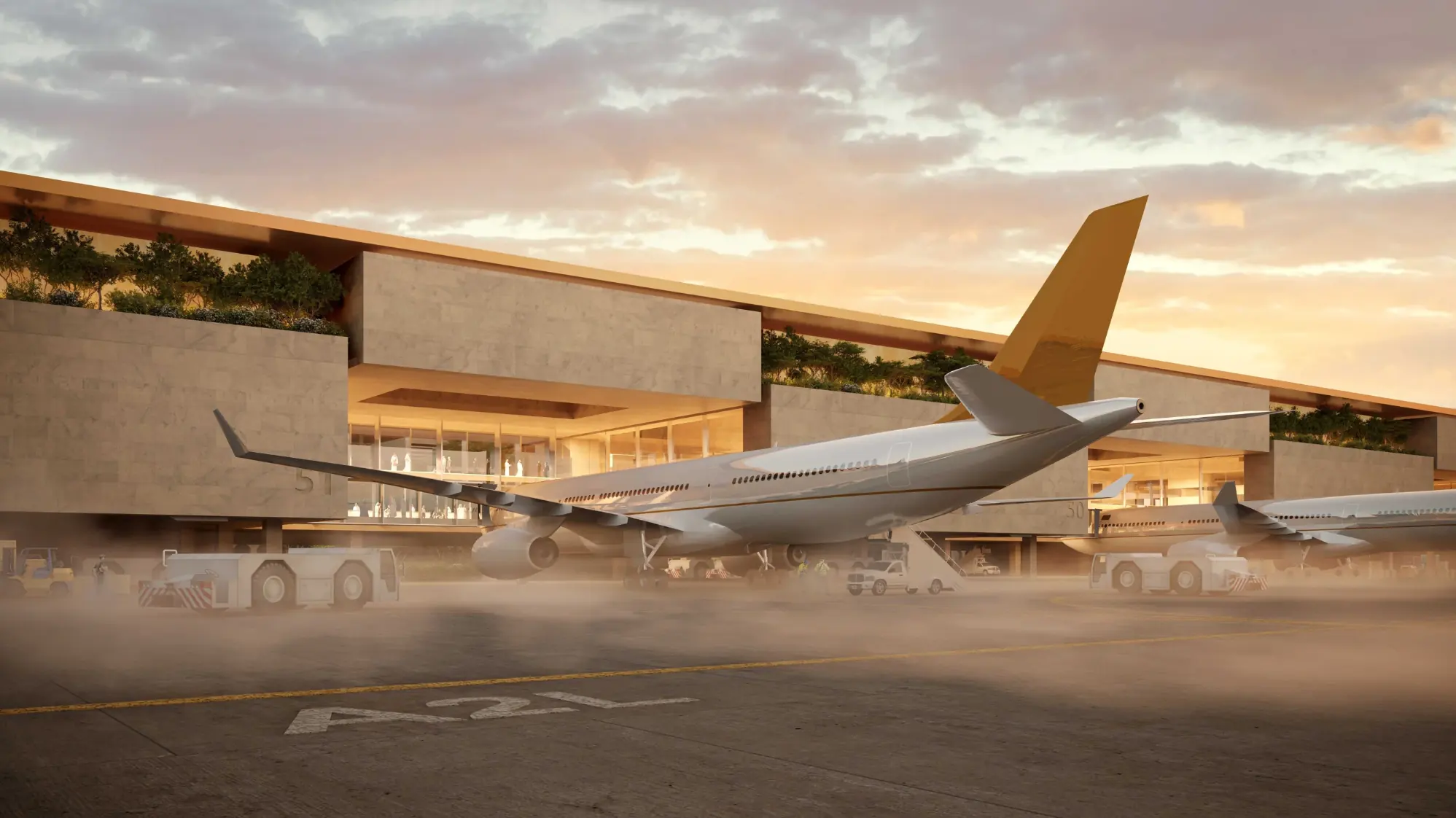 King Salman International Airport terminal façade and aircraft stands at dusk